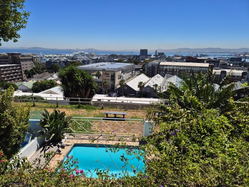 4 Bayview Terrace - bedroom 1 balcony view pool & harbour